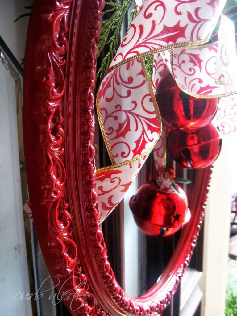 Red Framed Holiday Wreath with Dollar Store Supplies via curb alert!
